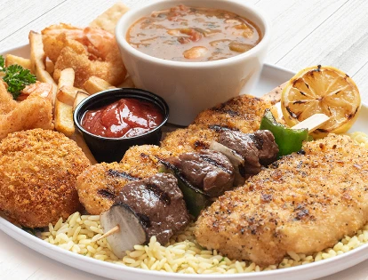 The Anniversary Plate with lemon pepper fish, charbroiled shrimp and beef kabob