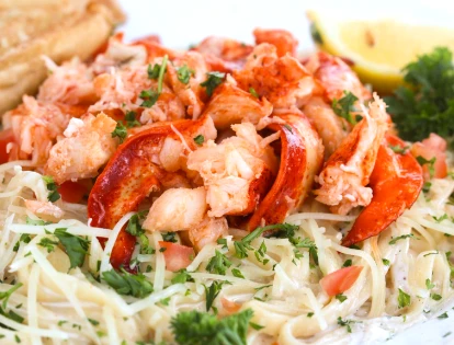 Tuscan Lobster Pasta with fresh Maine lobster in a creamy Tuscan butter sauce